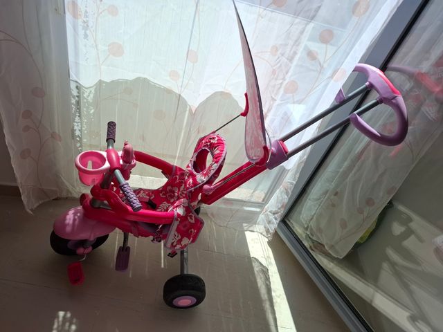 Triciclo rosa para bebé