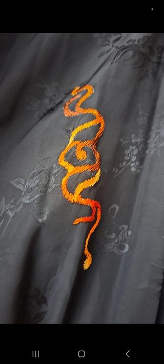 Bata estilo oriental con dragón