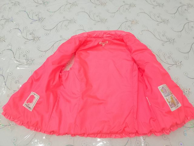 Gilet leggero fucsia con volant