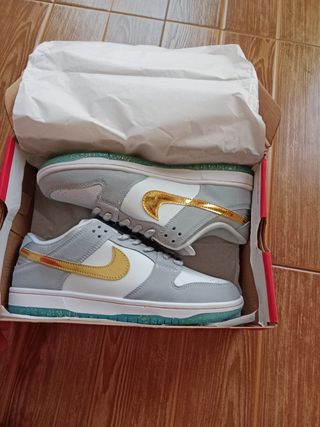 Nike SB Dunk Low Sean Cliver Dorado Gris Blanco