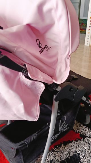 Silla de paseo rosa nueva