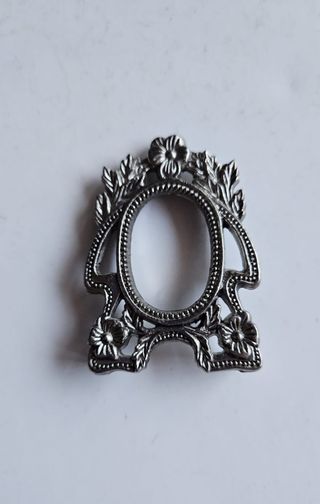 Marco portarretratos metálico antiguo