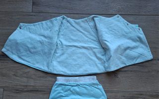 Tutina neonato azzurra con orsetto