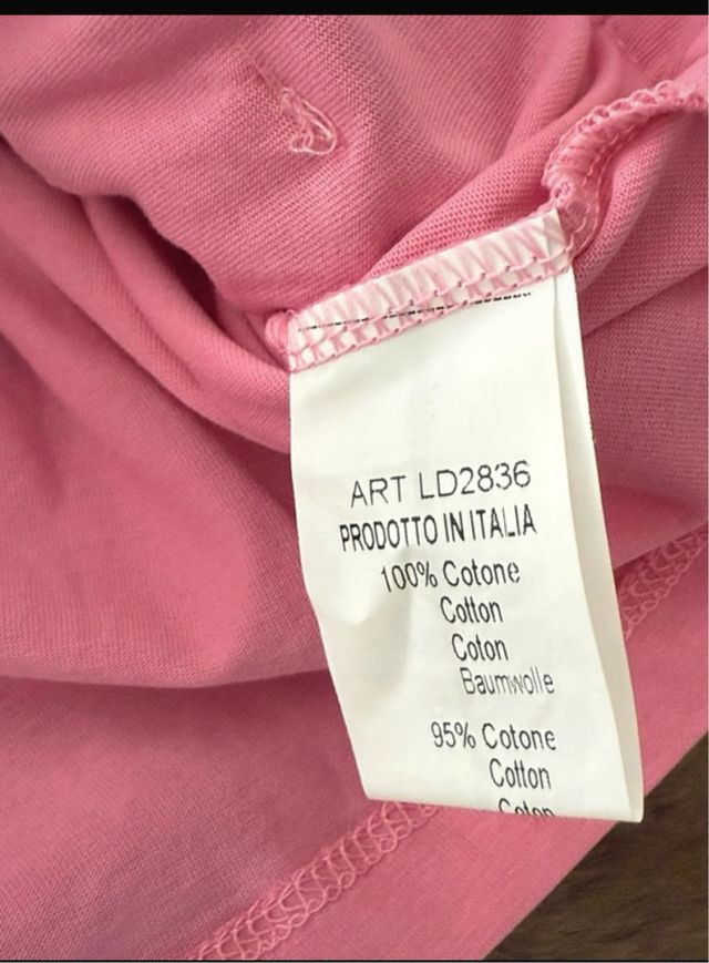 Top rosa con volantes