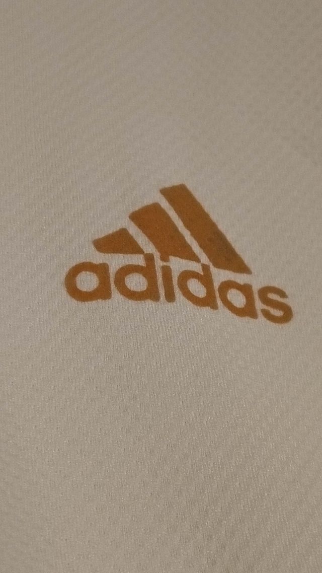 Camiseta técnic Adidas blanca y plateada Climacool