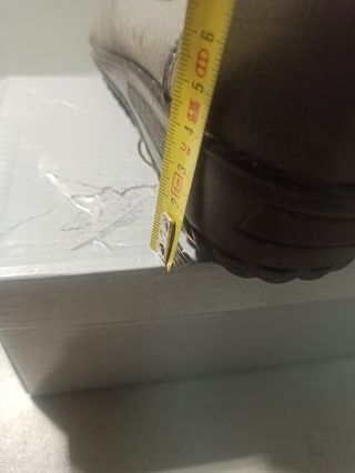 Mocasines grises con detalle de flecos