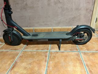 Patinete Eléctrico Xiaomi con su caja.