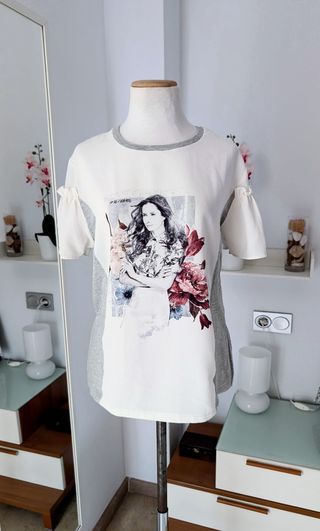 Bonita camiseta manga volante en L 40