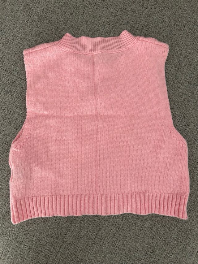 Chaleco de punto rosa