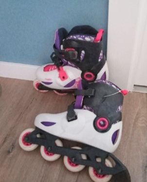 Patines Oxelo Play 5 rosas y blancos talla 32-34