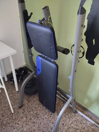 Banco ,discos y barras de gimnasio