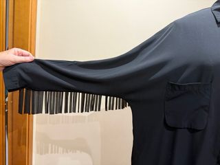 Camicia nera lunga con tasche