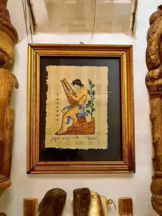 Quadro papiro con uomo che suona la lira