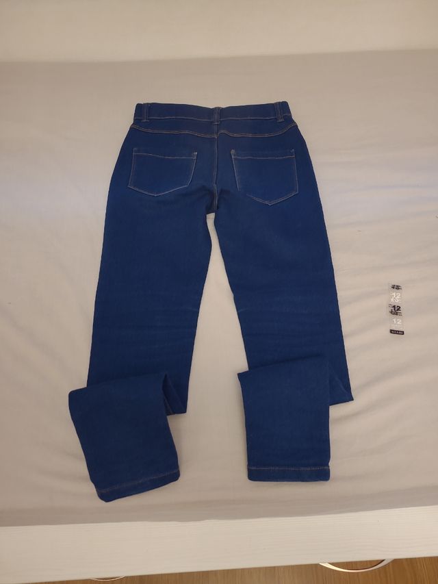 Pantalón vaquero elástico niña T.10