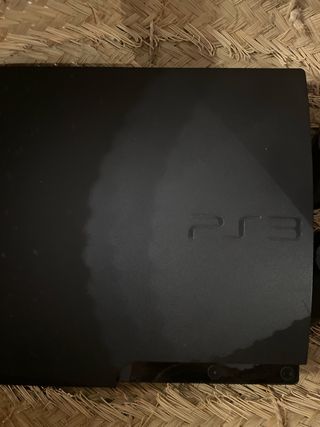 Playstation 3 Negra con un mando
