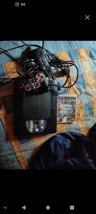 PS3 PlayStation 3 Negra con 2 mandos y juegos