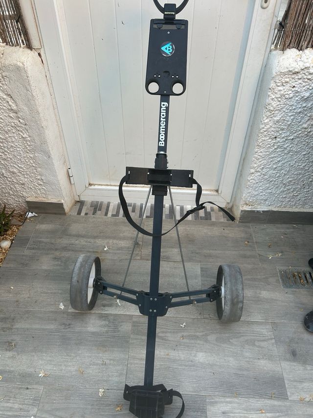 Carro de golf plegable. 