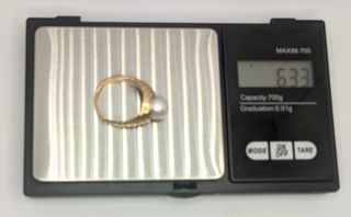 Anillo de oro de 18k con Perla, 6.33 g, T-17.