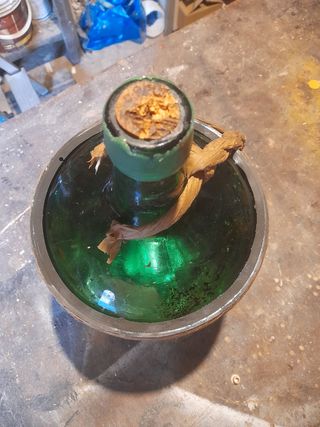 Coppia di vecchie damigiane verdi