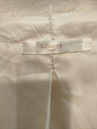 Abrigo pelo sintético marfil 