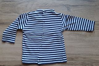 Maglia a righe blu e bianche