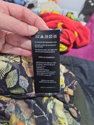 Cazadora de cuero negra y verde