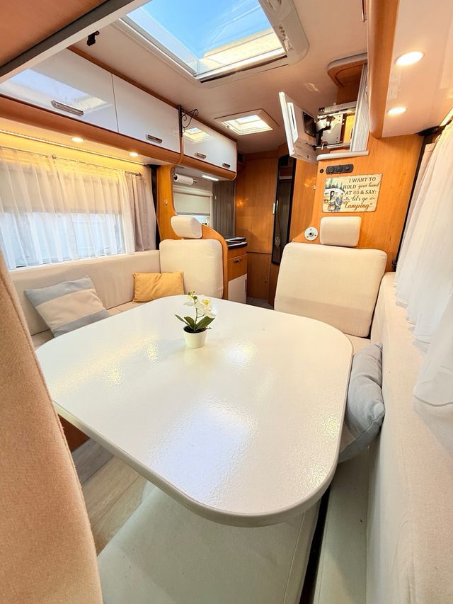 Autocaravana rutera 5.90m/aire//horno/alta gama