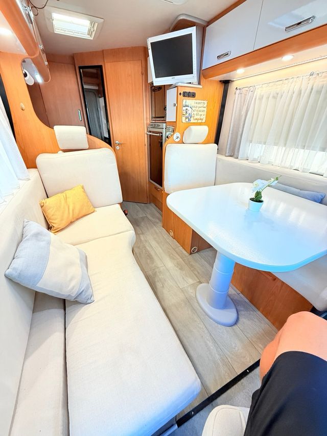 Autocaravana rutera 5.90m/aire//horno/alta gama