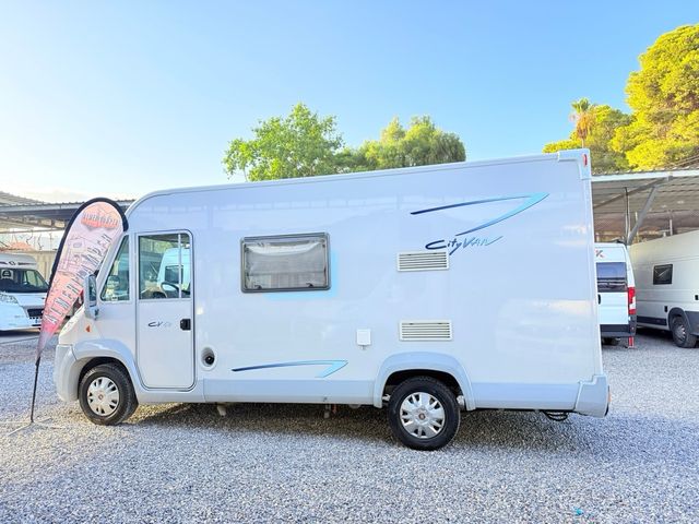 Autocaravana rutera 5.90m/aire//horno/alta gama
