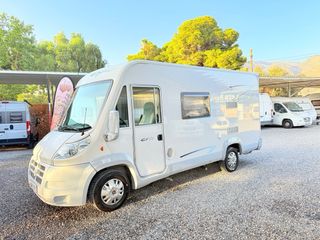 Autocaravana rutera 5.90m/aire//horno/alta gama 