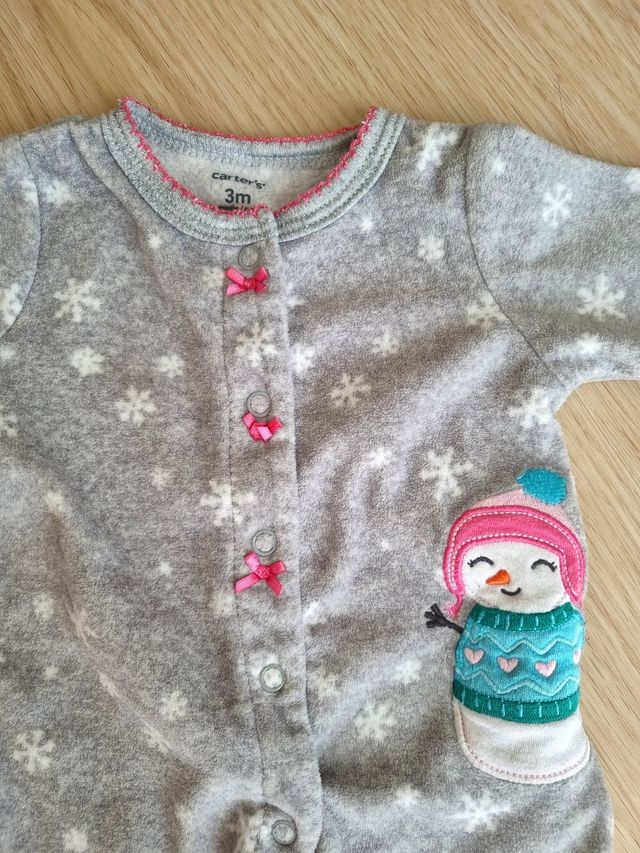 Mono bebé niña invierno muñeco nieve