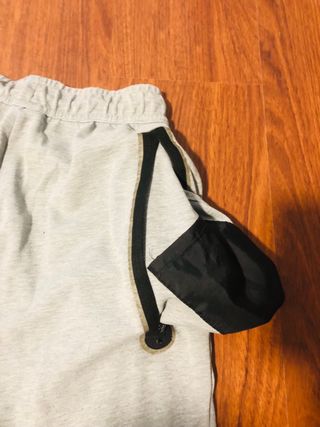 Pantalón Nike Tech Gris