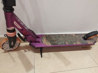 Patinete Oxelo Morado.