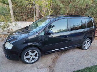 Touran 2003 All weather M+S Inyectores nevos