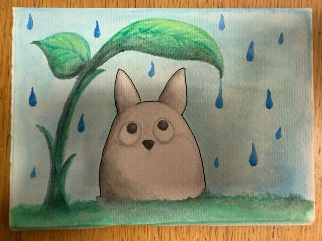 Marco de Totoro con dibujo de lluvia