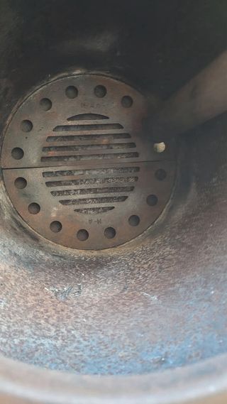 Estufa Redonda Metálica Gris marca Theca