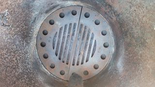 Estufa Redonda Metálica Gris marca Theca