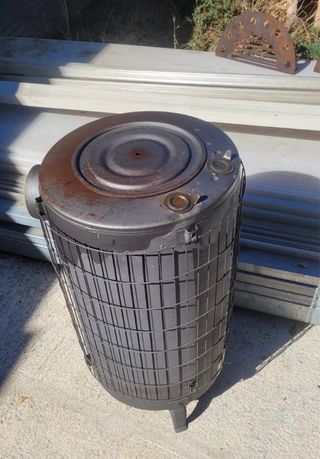 Estufa Redonda Metálica Gris marca Theca