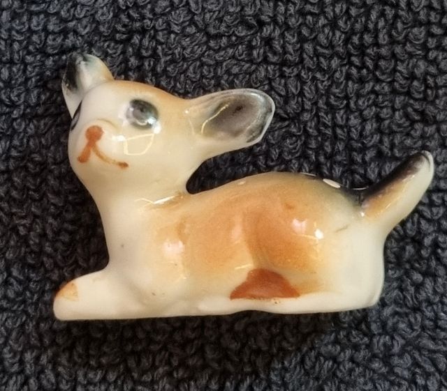 Set di figurini vintage in ceramica.