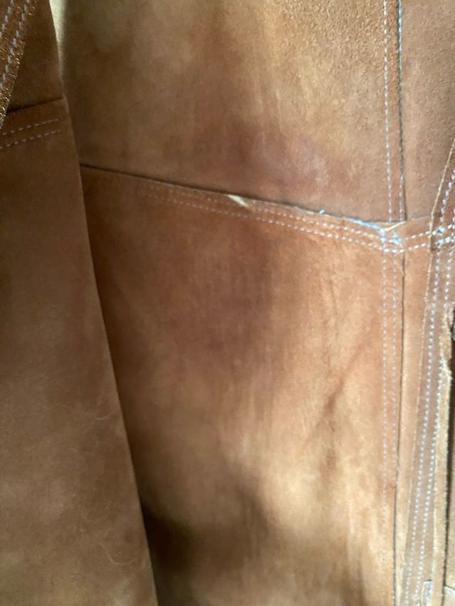 Gilet in camoscio con frange