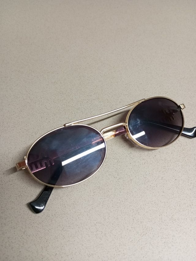 Gafas Miu Miu Doradas