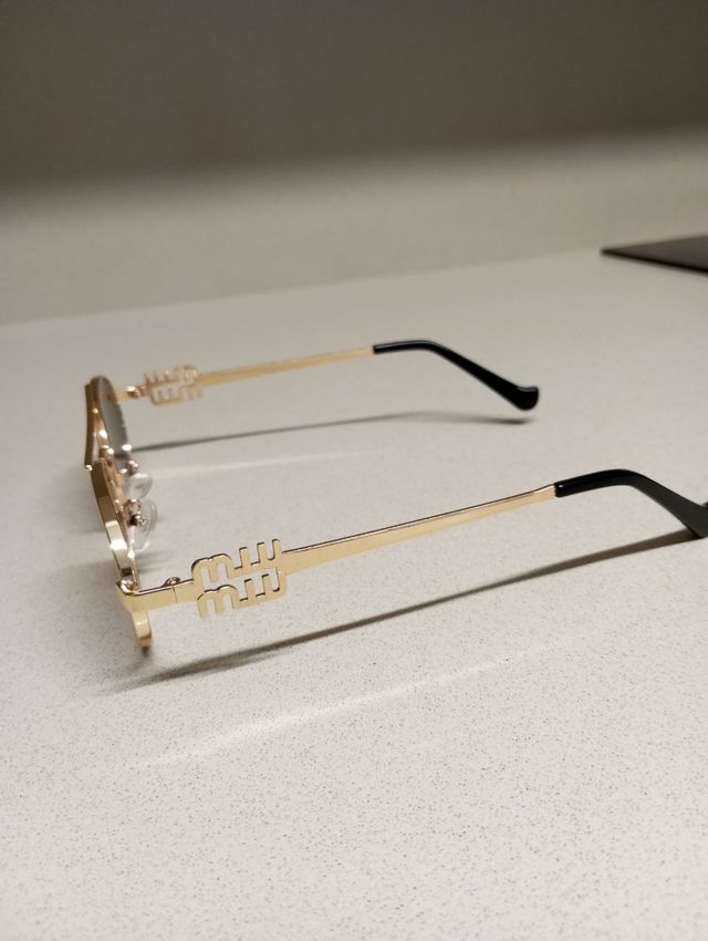 Gafas Miu Miu Doradas