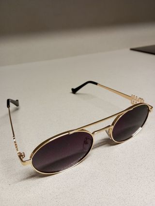 Gafas Miu Miu Doradas