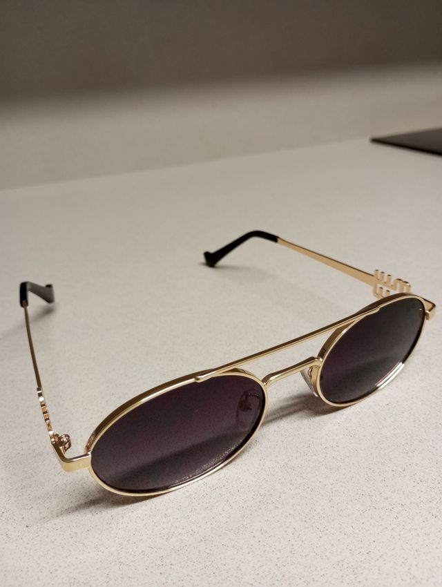 Gafas Miu Miu Doradas