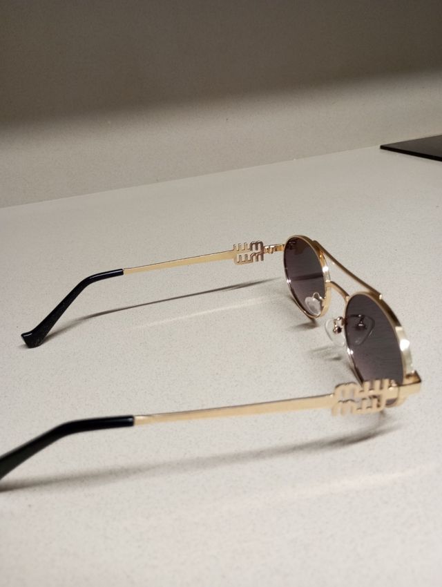 Gafas Miu Miu Doradas