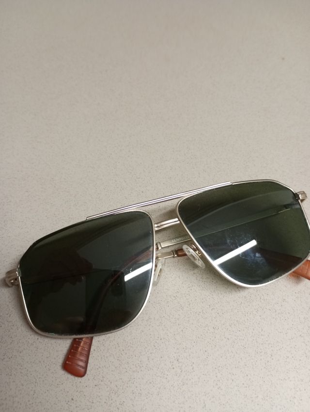 Gafas de sol Hawkers doradas y verdes