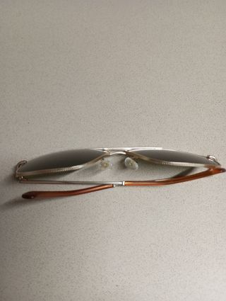 Gafas de sol Hawkers doradas y verdes