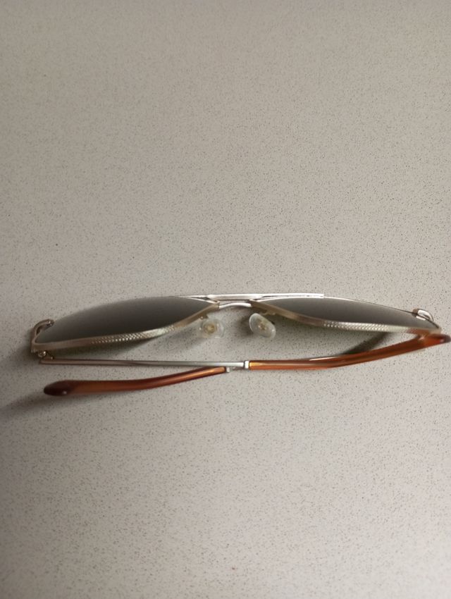 Gafas de sol Hawkers doradas y verdes