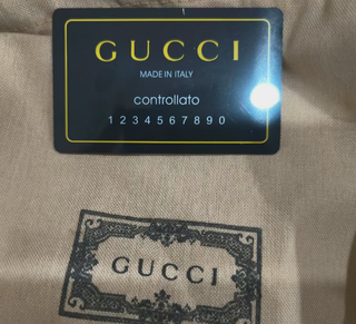Cinturón Gucci Doble G Negro y Dorado