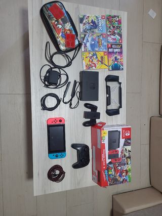 Nintendo Switch + 5 giochi + accessori.